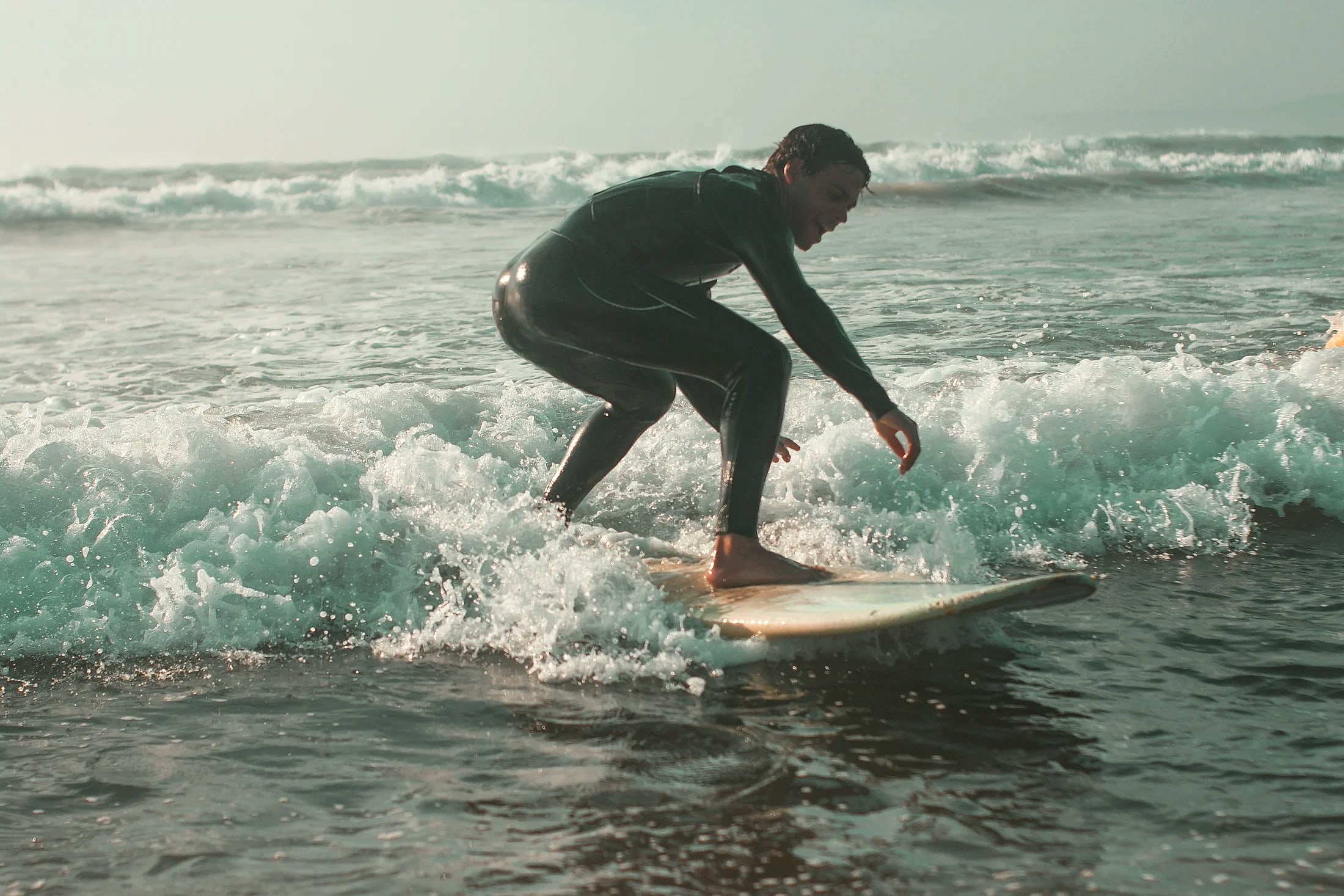 Surfer riding a wave in Morocco